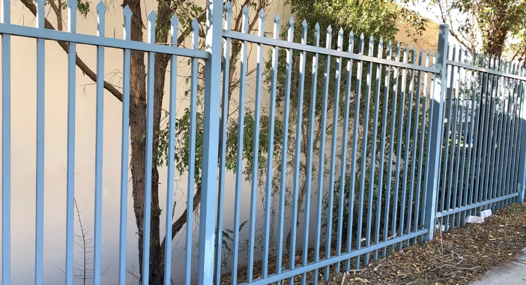 Steel Spear Top Security Fence near the road