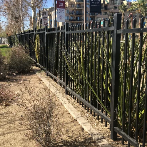 steel commercial spear top fence application