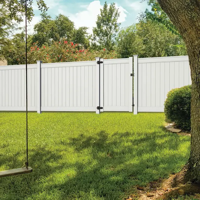 Single Swing Vinyl Gate in backyard