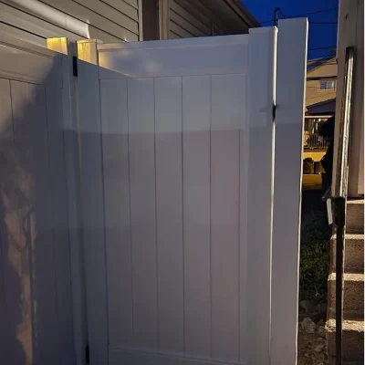 White Single Swing Vinyl Gate in Residential