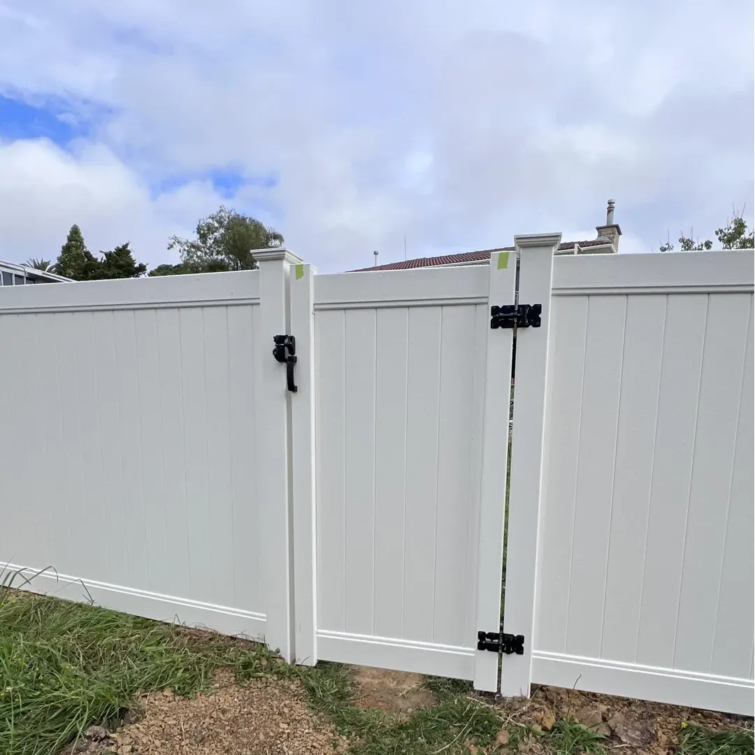 White Single Swing Vinyl Gate in Residential scene