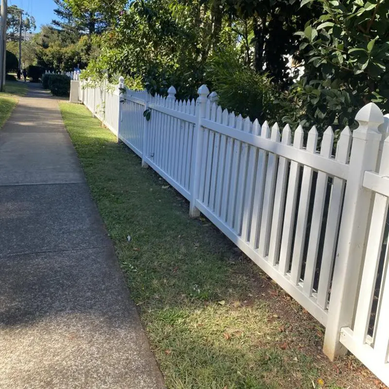 Picket Fence Post Caps in garden fence